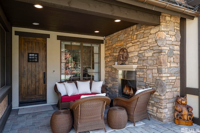 20588 Chanson Way, Reno, NV 89511 - view of exterior entry with an outdoor stone fireplace and stone siding