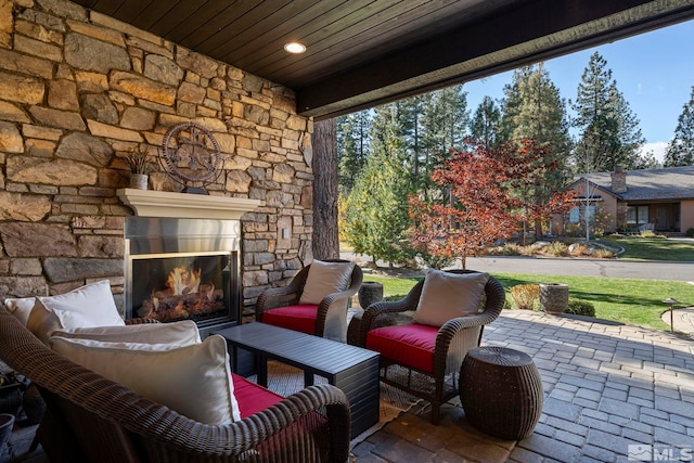 20588 Chanson Way, Reno, NV 89511 - view of patio / terrace featuring an outdoor living space with a fireplace