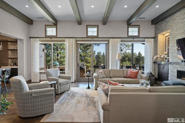 20588 Chanson Way, Reno, NV 89511 - living area featuring wood finished floors, a fireplace, beam ceiling, plenty of natural light, and recessed lighting