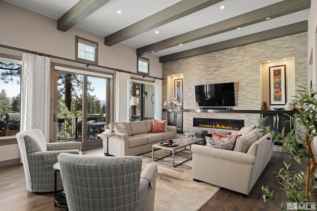 20588 Chanson Way, Reno, NV 89511 - living area with beam ceiling, wood finished floors, a fireplace, and recessed lighting
