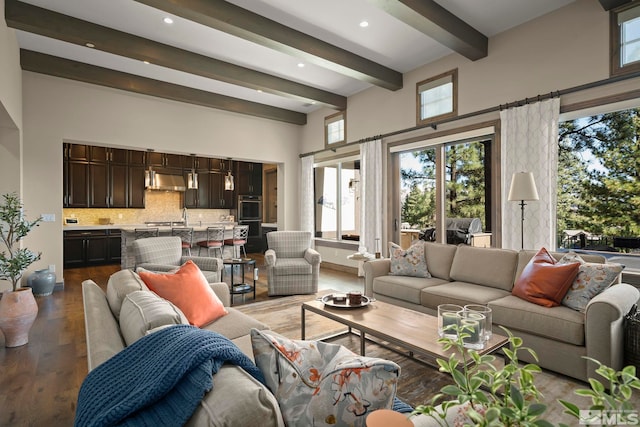 20588 Chanson Way, Reno, NV 89511 - living room with beamed ceiling, wood finished floors, plenty of natural light, recessed lighting, and a towering ceiling