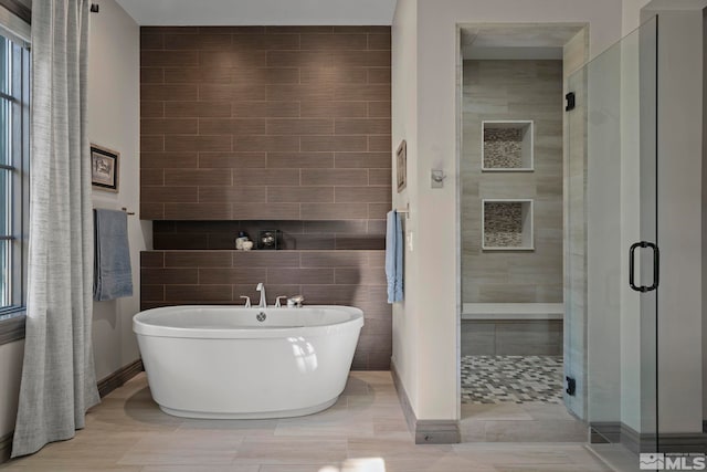 20588 Chanson Way, Reno, NV 89511 - bathroom featuring tile walls, a shower stall, and a soaking tub