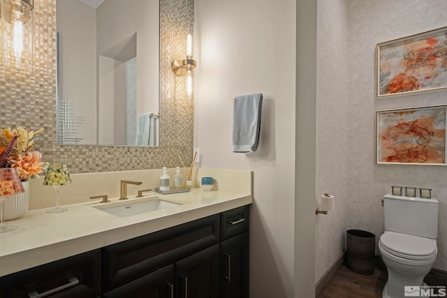 20588 Chanson Way, Reno, NV 89511 - bathroom with wood finished floors, vanity, toilet, and baseboards