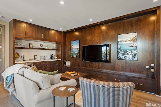 20588 Chanson Way, Reno, NV 89511 - living area with wooden walls, light wood finished floors, and recessed lighting