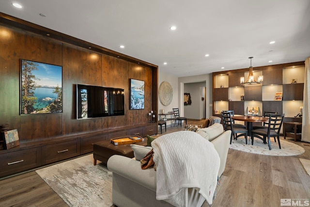 20588 Chanson Way, Reno, NV 89511 - living room featuring light wood-style flooring, recessed lighting, and a chandelier