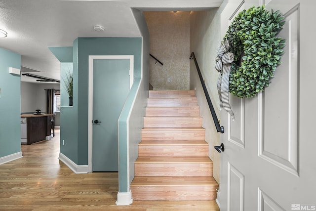 5625 Vista Luna Dr Unit 102, Sparks, NV 89436 - stairway with wood finished floors and baseboards