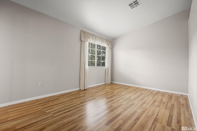 5625 Vista Luna Dr Unit 102, Sparks, NV 89436 - spare room with wood finished floors and baseboards