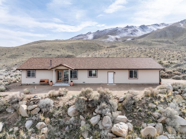 217 Shetland Cir, Reno, NV 89508 - back of property with a mountain view and a patio area