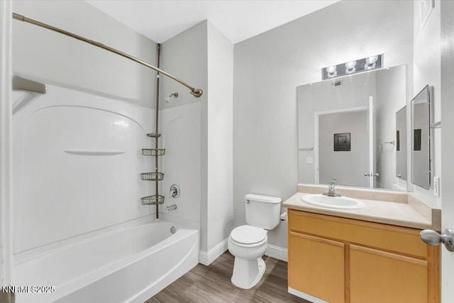 6850 Sharlands Ave Unit U1122, Reno, NV 89523 - bathroom featuring toilet, shower / bath combination, vanity, wood finished floors, and baseboards