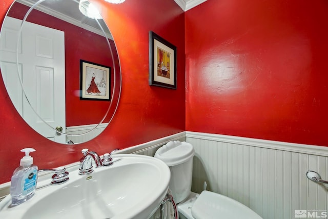 114 Angora Ct Unit A, Zephyr Cove, NV 89448 - half bath with a sink, wainscoting, toilet, and ornamental molding