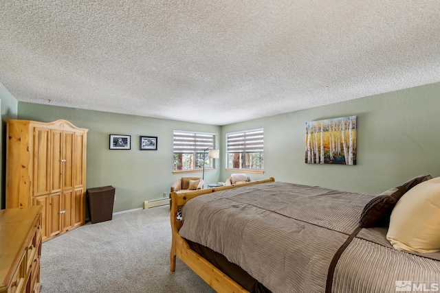 114 Angora Ct Unit A, Zephyr Cove, NV 89448 - carpeted bedroom with a baseboard radiator, a textured ceiling, and baseboards