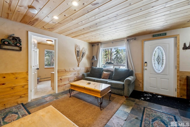 114 Angora Ct Unit A, Zephyr Cove, NV 89448 - living room featuring stone tile flooring, wood ceiling, recessed lighting, and a baseboard radiator
