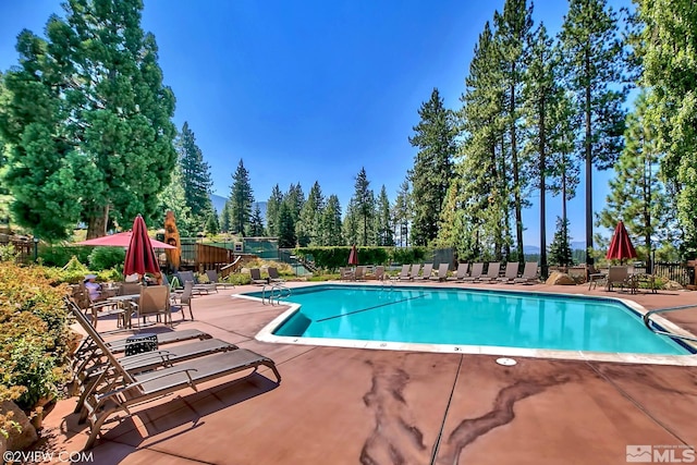114 Angora Ct Unit A, Zephyr Cove, NV 89448 - community pool featuring a patio and fence