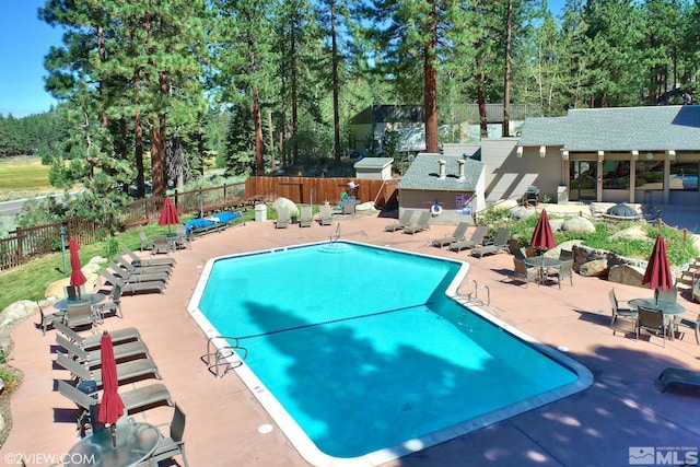 114 Angora Ct Unit A, Zephyr Cove, NV 89448 - community pool featuring fence, a patio area, and an outdoor fire pit