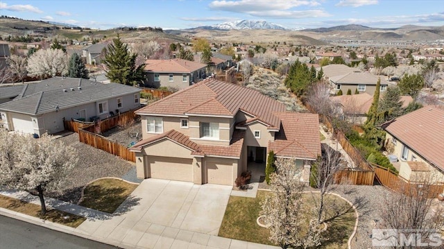 6131 Axis Dr, Sparks, NV 89436 - aerial view of residential area with a mountainous background