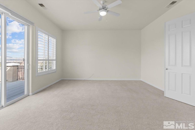 6131 Axis Dr, Sparks, NV 89436 - unfurnished room featuring carpet flooring, a ceiling fan, and baseboards