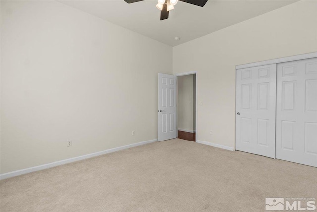 6131 Axis Dr, Sparks, NV 89436 - unfurnished bedroom with carpet, baseboards, a closet, and ceiling fan