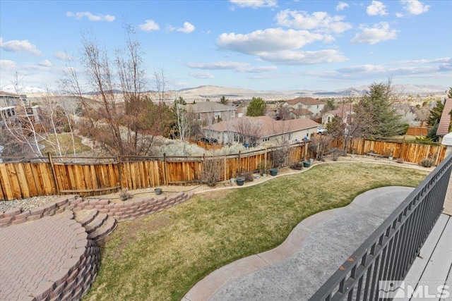 6131 Axis Dr, Sparks, NV 89436 - view of yard featuring a mountain view and a residential view