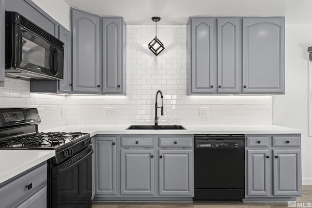 820 Oriole Way Unit 51, Incline Village, NV 89451 - kitchen with black appliances, gray cabinets, and a sink