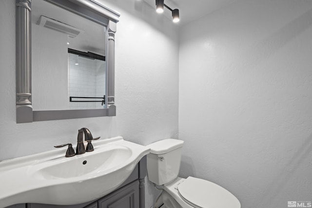 820 Oriole Way Unit 51, Incline Village, NV 89451 - bathroom with toilet, a textured wall, and vanity