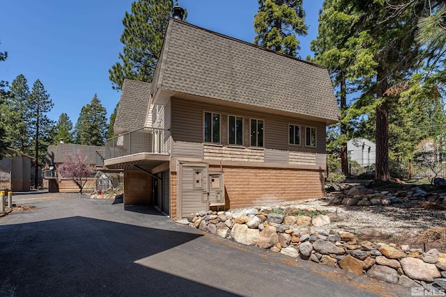 820 Oriole Way Unit 51, Incline Village, NV 89451 - view of front of property with a shingled roof and a balcony