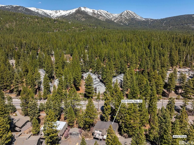 820 Oriole Way Unit 51, Incline Village, NV 89451 - drone / aerial view of a heavily wooded area and a mountain backdrop