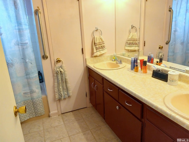 115 Smithridge Park, Reno, NV 89502 - full bath featuring double vanity, marble finish floors, and shower / bath combo with shower curtain