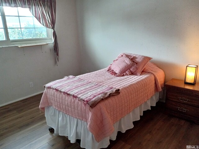 115 Smithridge Park, Reno, NV 89502 - bedroom with wood finished floors and baseboards