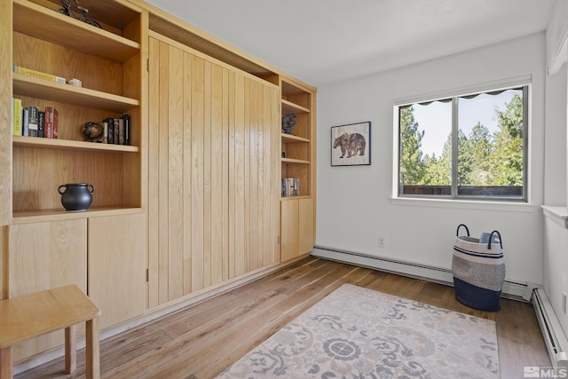 335 Ski Way Unit 313, Incline Village, NV 89451 - empty room with a baseboard heating unit and wood finished floors
