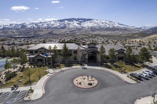 view of mountain background featuring nearby suburban area