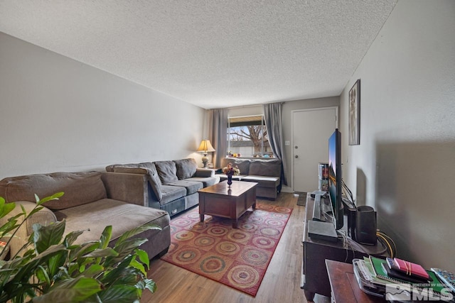 1672 Sue Way, Sparks, NV 89431 - living area featuring wood finished floors and a textured ceiling