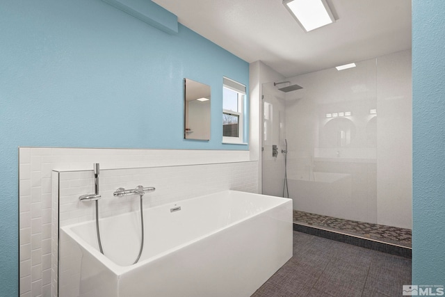 920 Pinebrook Rd, Reno, NV 89509 - bathroom featuring walk in shower and a freestanding tub