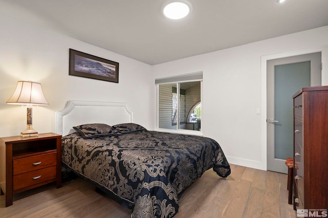 920 Pinebrook Rd, Reno, NV 89509 - bedroom with wood finished floors and baseboards
