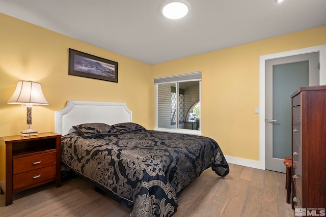 920 Pinebrook Rd, Reno, NV 89509 - bedroom with wood finished floors and baseboards