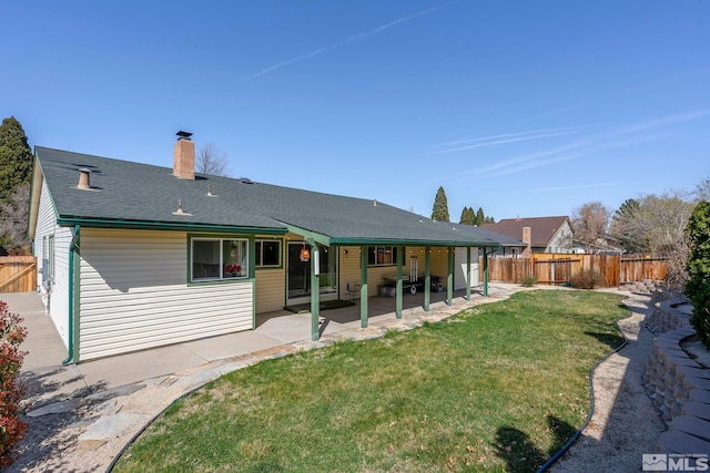 920 Pinebrook Rd, Reno, NV 89509 - back of house with a patio, a chimney, and a shingled roof