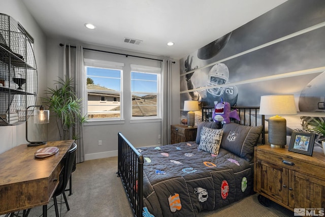 carpeted bedroom featuring recessed lighting and baseboards