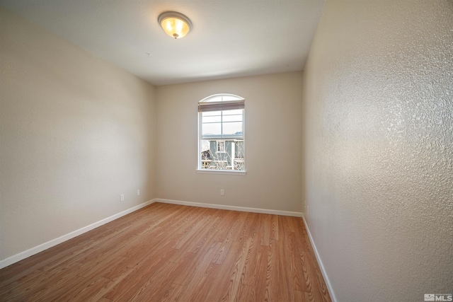 2590 Spring Flower Dr, Reno, NV 89521 - spare room featuring light wood-type flooring and baseboards