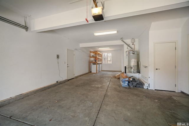 2590 Spring Flower Dr, Reno, NV 89521 - garage featuring secured water heater and a garage door opener