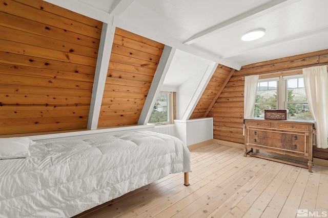 15290 Cherrywood Dr, Reno, NV 89511 - bedroom featuring multiple windows, rustic walls, and light wood-style flooring