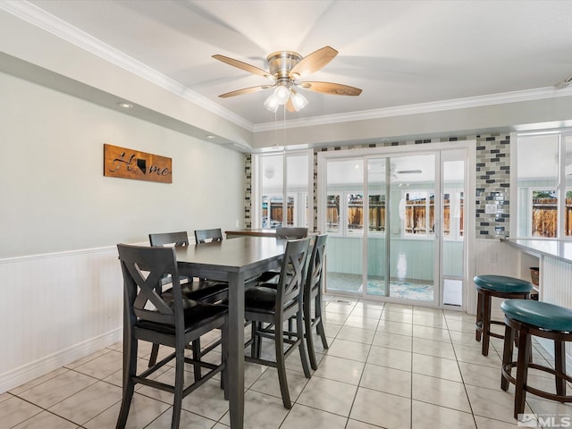 286 Woodlake Cir, Dayton, NV 89403 - dining area with ornamental molding, ceiling fan, light tile patterned flooring, and wainscoting