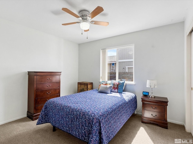 286 Woodlake Cir, Dayton, NV 89403 - bedroom with carpet floors, ceiling fan, and baseboards