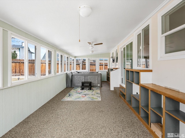286 Woodlake Cir, Dayton, NV 89403 - sunroom featuring a wood stove, ornamental molding, carpet flooring, and a hot tub