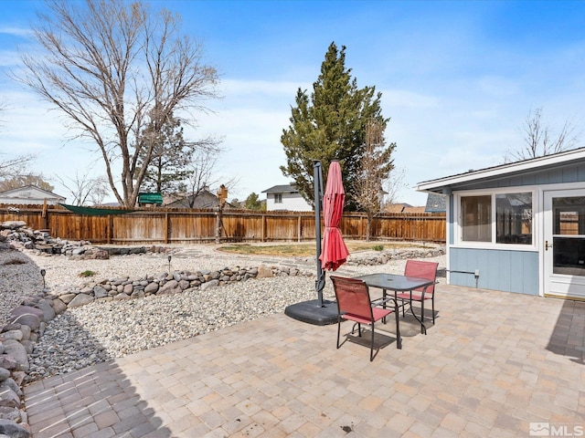 286 Woodlake Cir, Dayton, NV 89403 - view of patio featuring a fenced backyard and outdoor dining area
