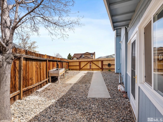 286 Woodlake Cir, Dayton, NV 89403 - fenced backyard featuring a gate
