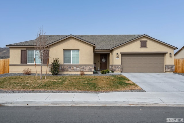 1981 Lanstar Dr, Sparks, NV 89441 - single story home featuring stucco siding, stone siding, and an attached garage