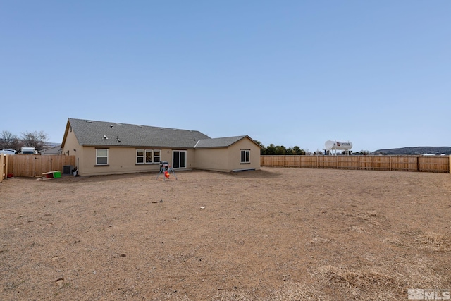 1981 Lanstar Dr, Sparks, NV 89441 - rear view of property with stucco siding and a fenced backyard