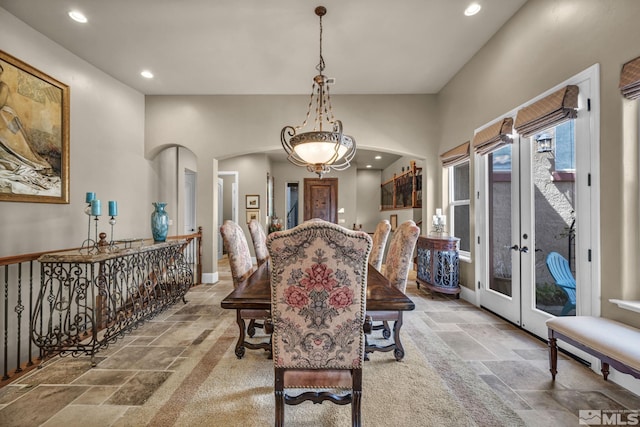 5140 Belsera Ct, Reno, NV 89519 - dining space featuring stone tile flooring, recessed lighting, french doors, and baseboards