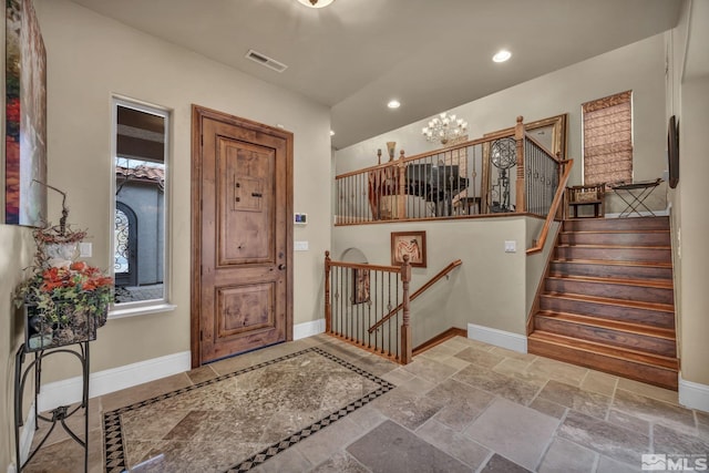 5140 Belsera Ct, Reno, NV 89519 - entrance foyer featuring baseboards, a chandelier, recessed lighting, stairway, and stone tile floors