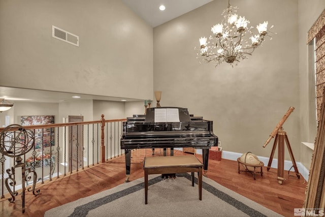 5140 Belsera Ct, Reno, NV 89519 - sitting room featuring wood finished floors, a chandelier, baseboards, recessed lighting, and a towering ceiling