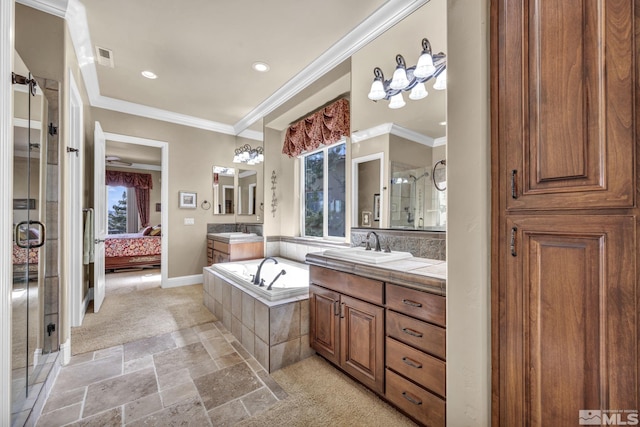 5140 Belsera Ct, Reno, NV 89519 - ensuite bathroom with a stall shower, ornamental molding, a bath, two vanities, and baseboards